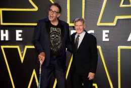 Peter Mayhew and Harrison Ford poses for photographers upon arrival at the European premiere of the film 'Star Wars: The Force Awakens ' in London, Wednesday, Dec. 16, 2015. (Photo by Jonathan Short/Invision/AP)