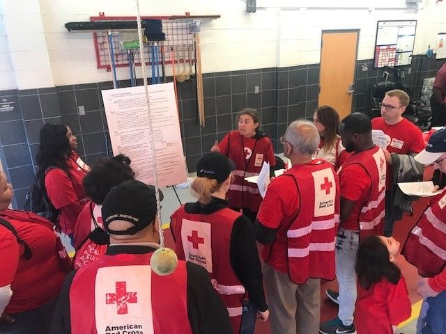 Volunteers are briefed before one recent "Sound the Alarm" activity. (Courtesy National Capitol Region American Red Cross/Paul Carden)