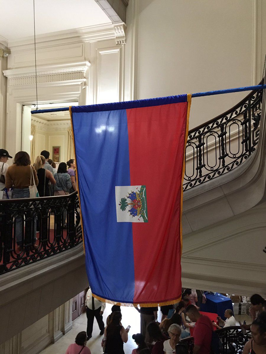 The flag of Haiti hangs in the Haitian Embassy on May 4, 2019. (WTOP/Liz Anderson)