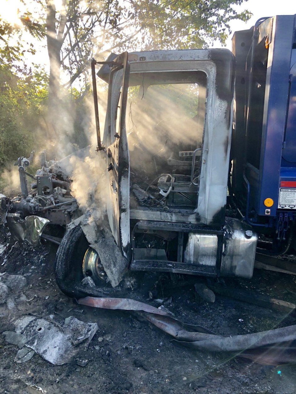 A garbage truck crashed and caught fire Wednesday morning in Montgomery County. (Courtesy Montgomery County Fire & Rescue)