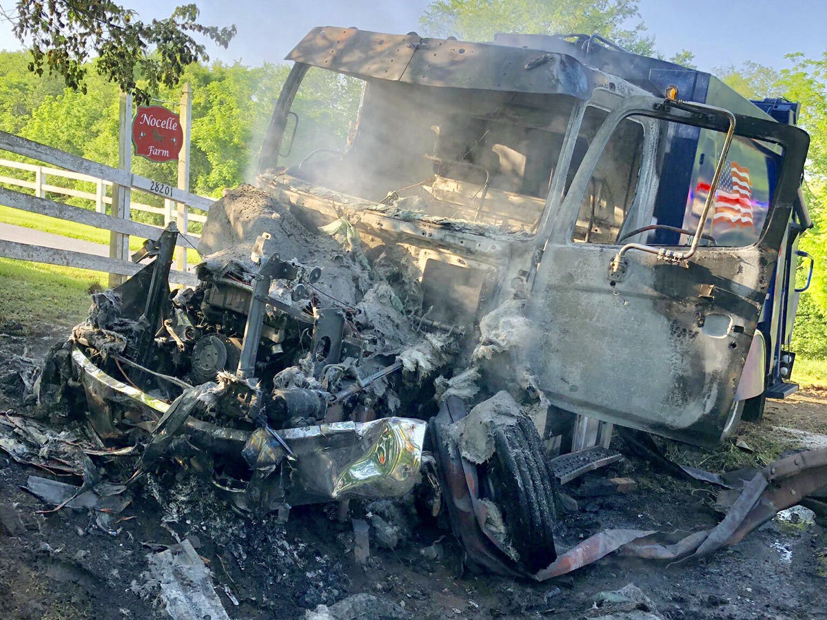 A garbage truck crashed and caught fire Wednesday morning in Montgomery County. (Courtesy Montgomery County Fire & Rescue/Pete Piringer)