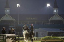Kentucky Derby hopeful Gray Magician is led onto the track for a workout at Churchill Downs Tuesday, April 30, 2019, in Louisville, Ky. The 145th running of the Kentucky Derby is scheduled for Saturday, May 4. (AP Photo/Charlie Riedel)
