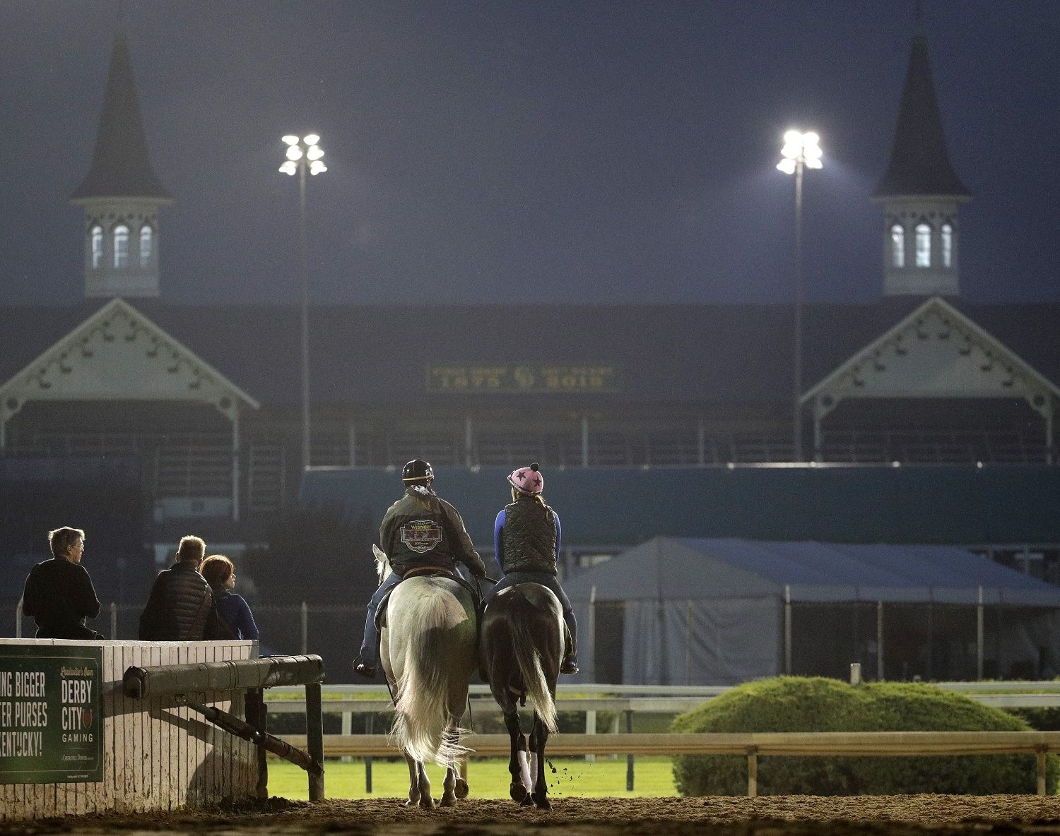 Kentucky Derby hopeful Gray Magician is led onto the track for a workout at Churchill Downs Tuesday, April 30, 2019, in Louisville, Ky. The 145th running of the Kentucky Derby is scheduled for Saturday, May 4. (AP Photo/Charlie Riedel)
