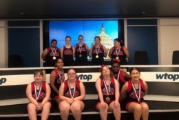 The JOY Supernovas, pictured here visiting the WTOP studios, became the first Special Olympics traditional cheerleading team to compete and win at the Cheerleading World Championships. (WTOP/Mike Murillo)