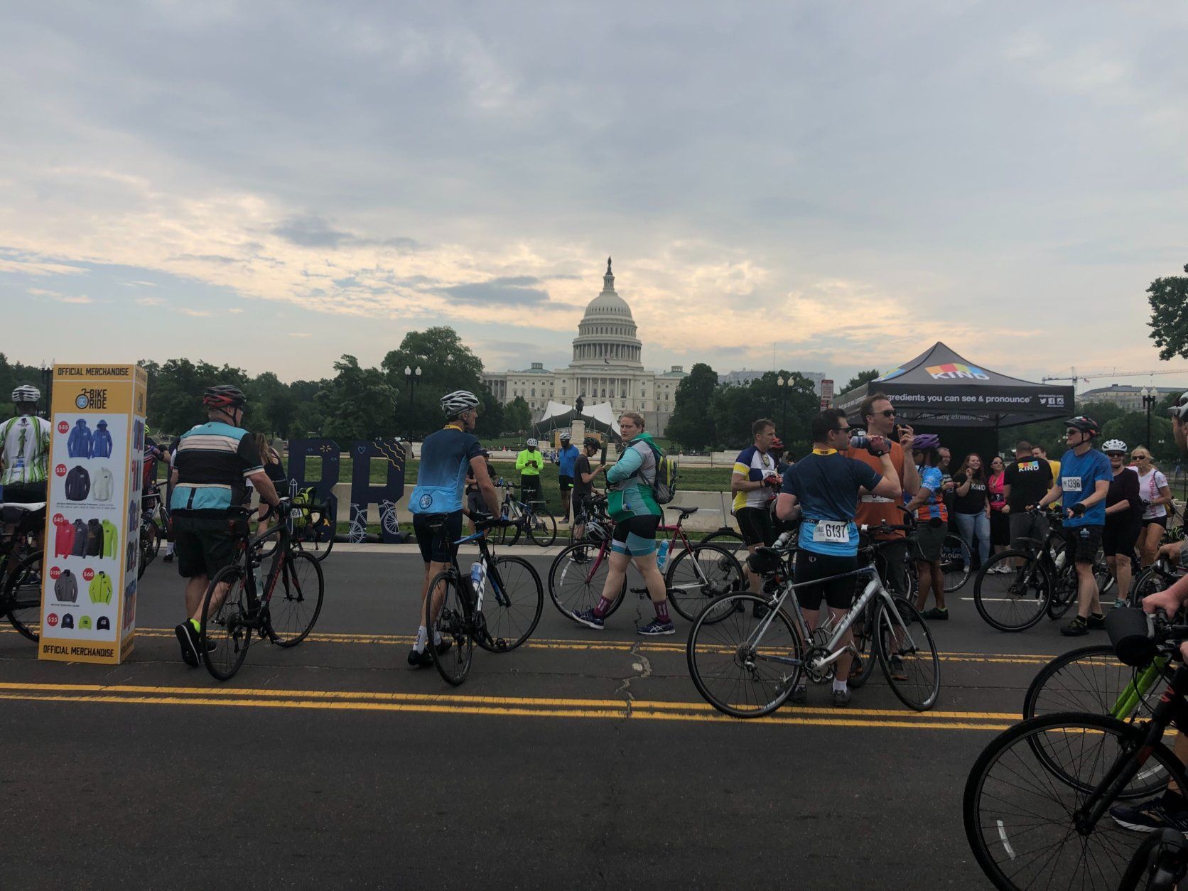 Bikers ride by the Capitol Building in a car-free D.C. as they take part in the D.C. Bike Ride. (WTOP/Melissa Howell)