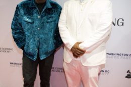 Executive Director of the Recording Academy D.C. chapter, Jeriel Johnson and Wale, celebrate the local music community at the inaugural Washington D.C. Chapter block party. (Courtesy of The Recording Academy/Brian Stukes)