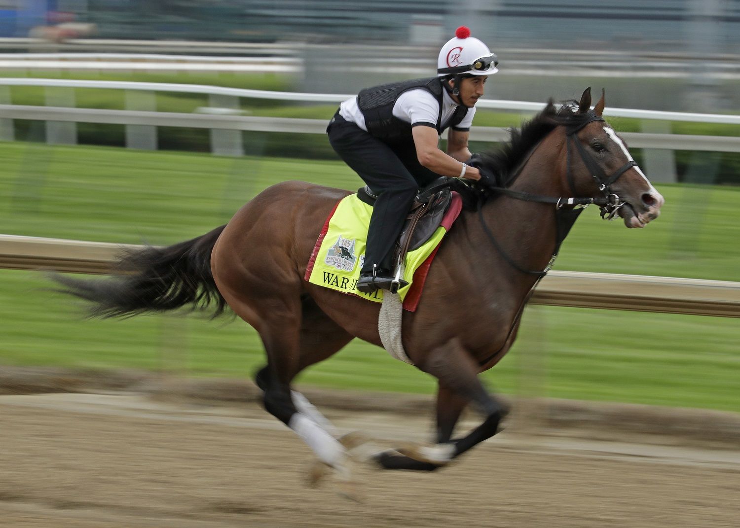 Kentucky Derby hopeful War of Will is ridden during a workout at Churchill Downs Tuesday, April 30, 2019, in Louisville, Ky. The 145th running of the Kentucky Derby is scheduled for Saturday, May 4. (AP Photo/Charlie Riedel)
