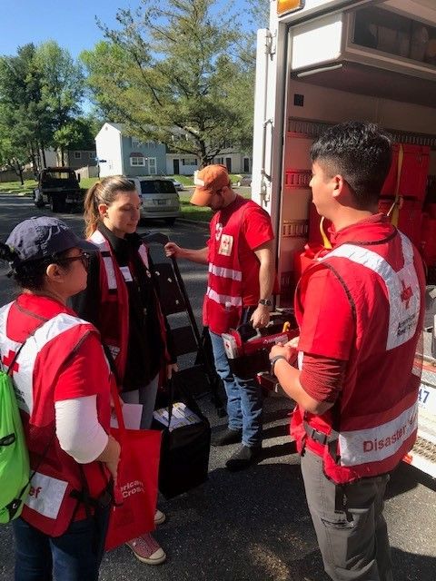 On Saturday, about 100 volunteers participated in a Sound the Alarm event in Capitol Heights, Maryland. (Courtesy National Capitol Region American Red Cross/Paul Carden)