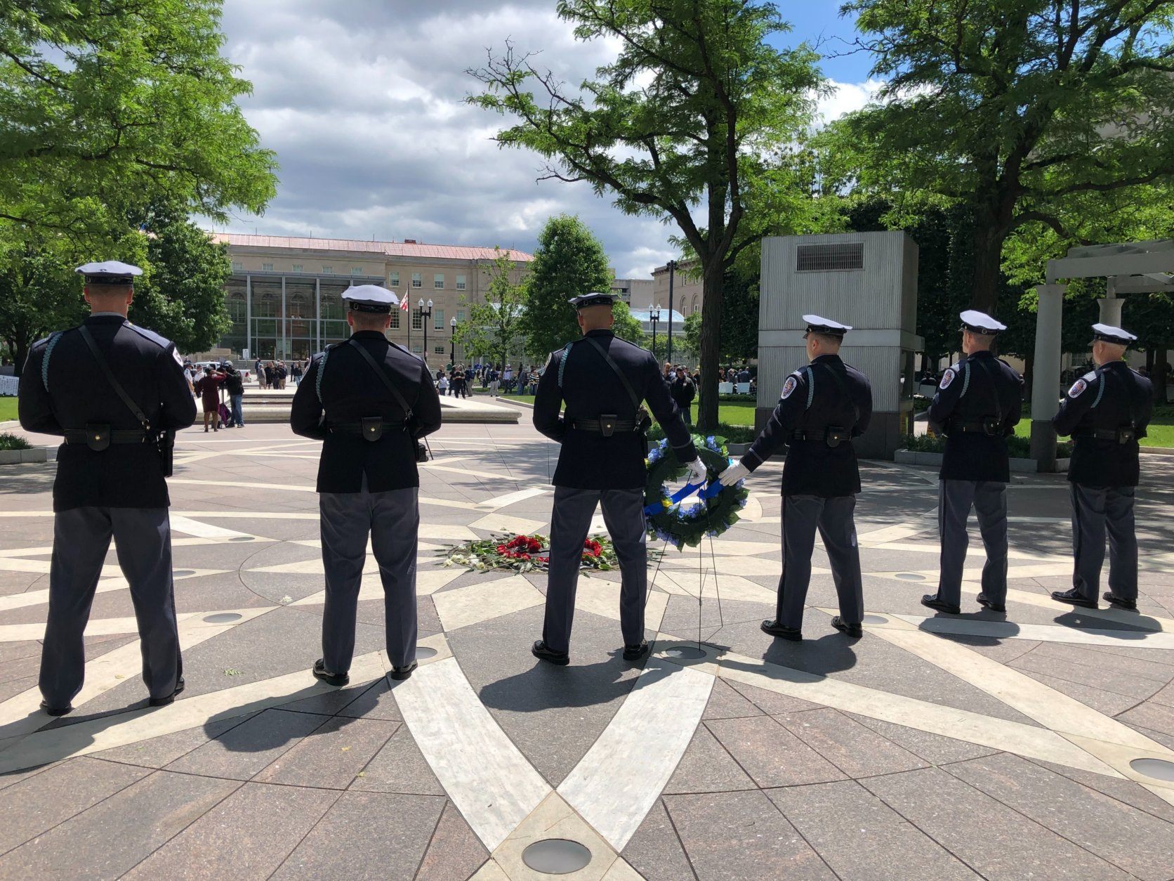 Law enforcement officers stand guard during a vigil Tuesday, May 14, 2019, to honor fallen officers.
(WTOP/Kristi King)