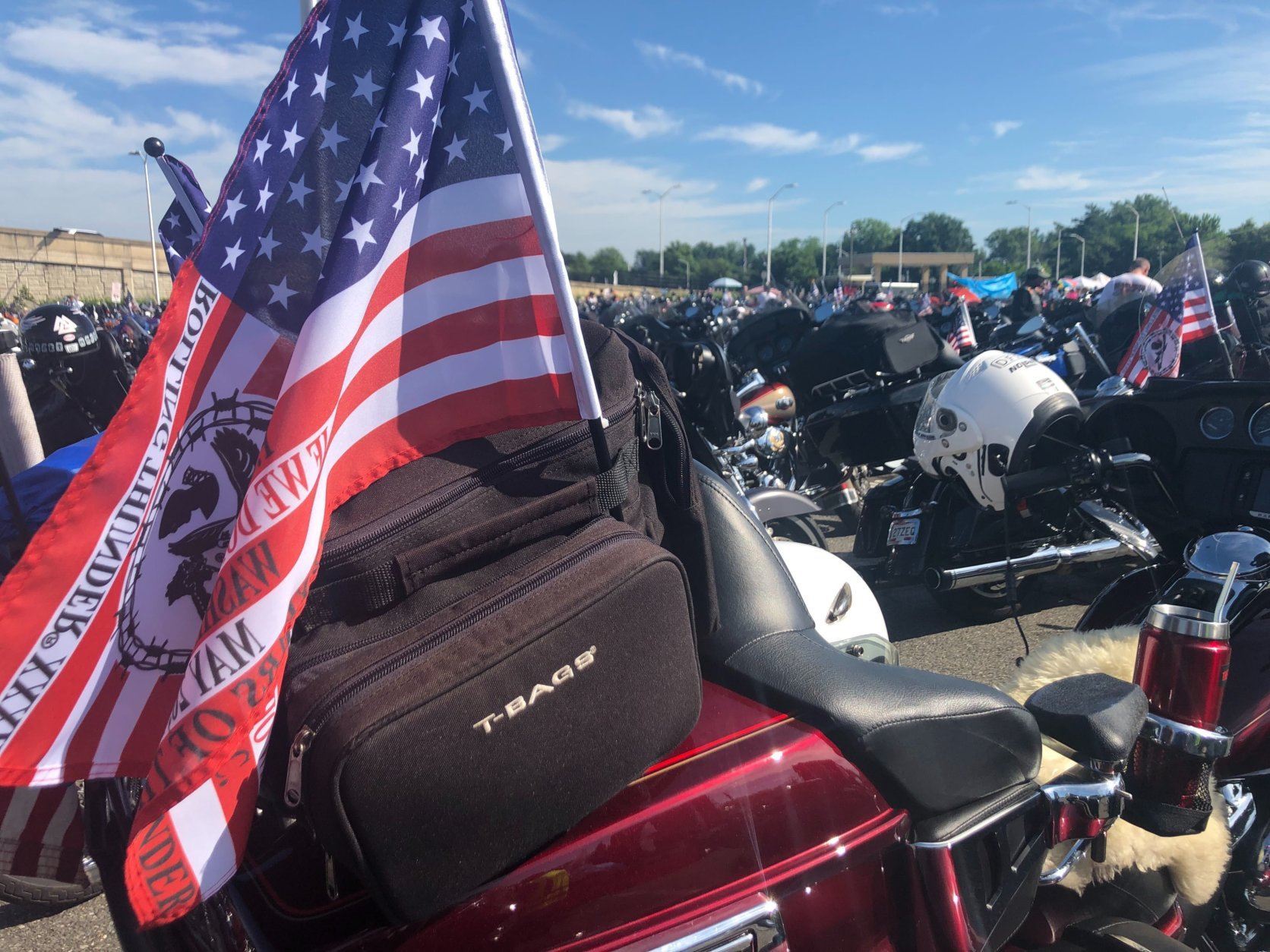 The American flag flies from the back of a motorcycle. (WTOP/Melissa Howell) 