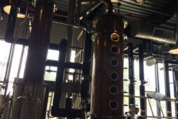 The distillery itself is a modern building with lots of modern distilling equipment, all wrapped in items dating back to 1933 or before. (WTOP/John Domen)