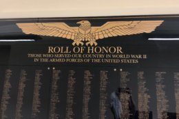A memorial shows the names of D.C. employees who served in World War II. (WTOP/Kristi King)