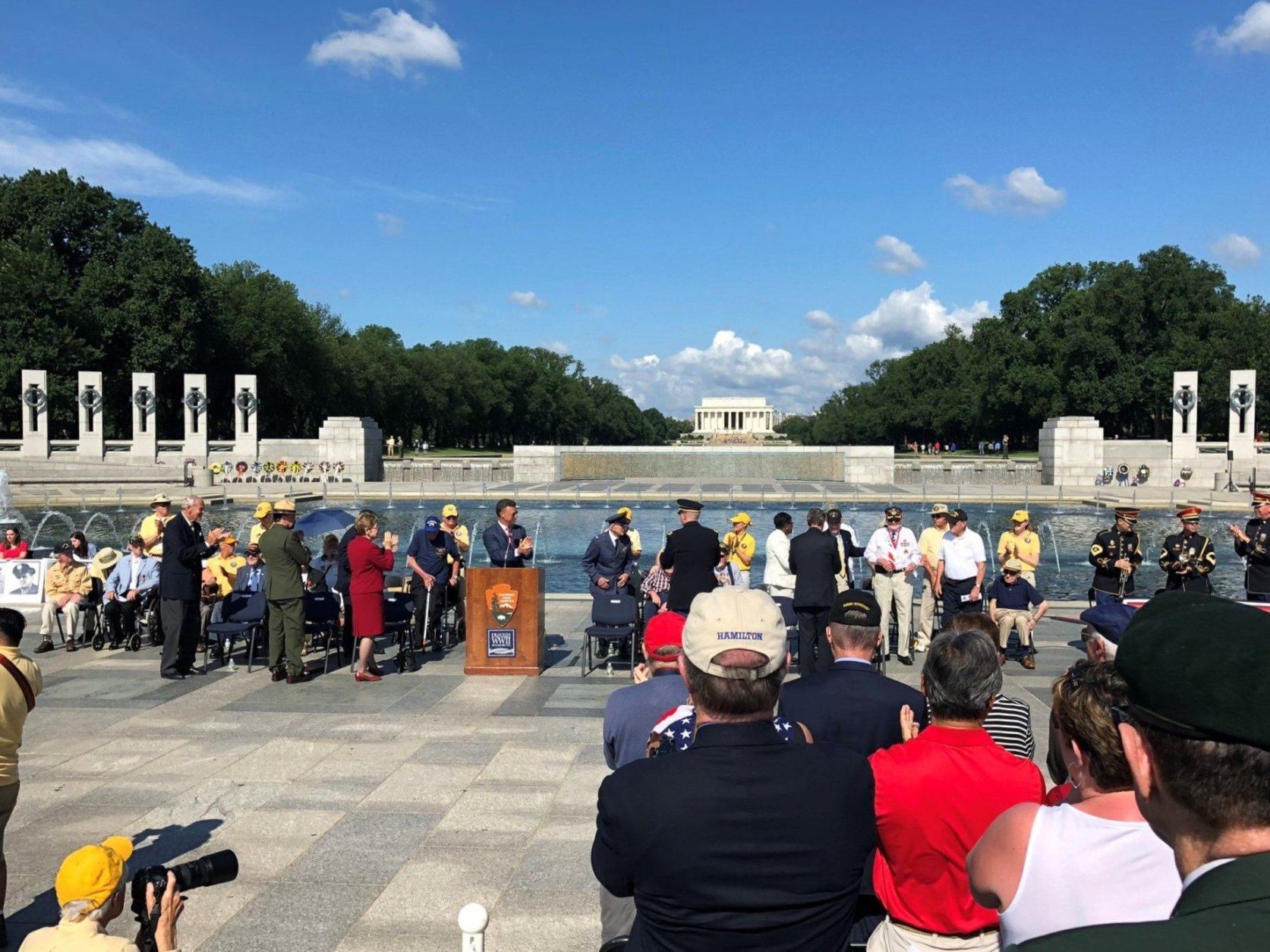 Roaring applause takes place at the World War II Memorial on Monday, May 27, 2019. (WTOP/Keara Dowd)