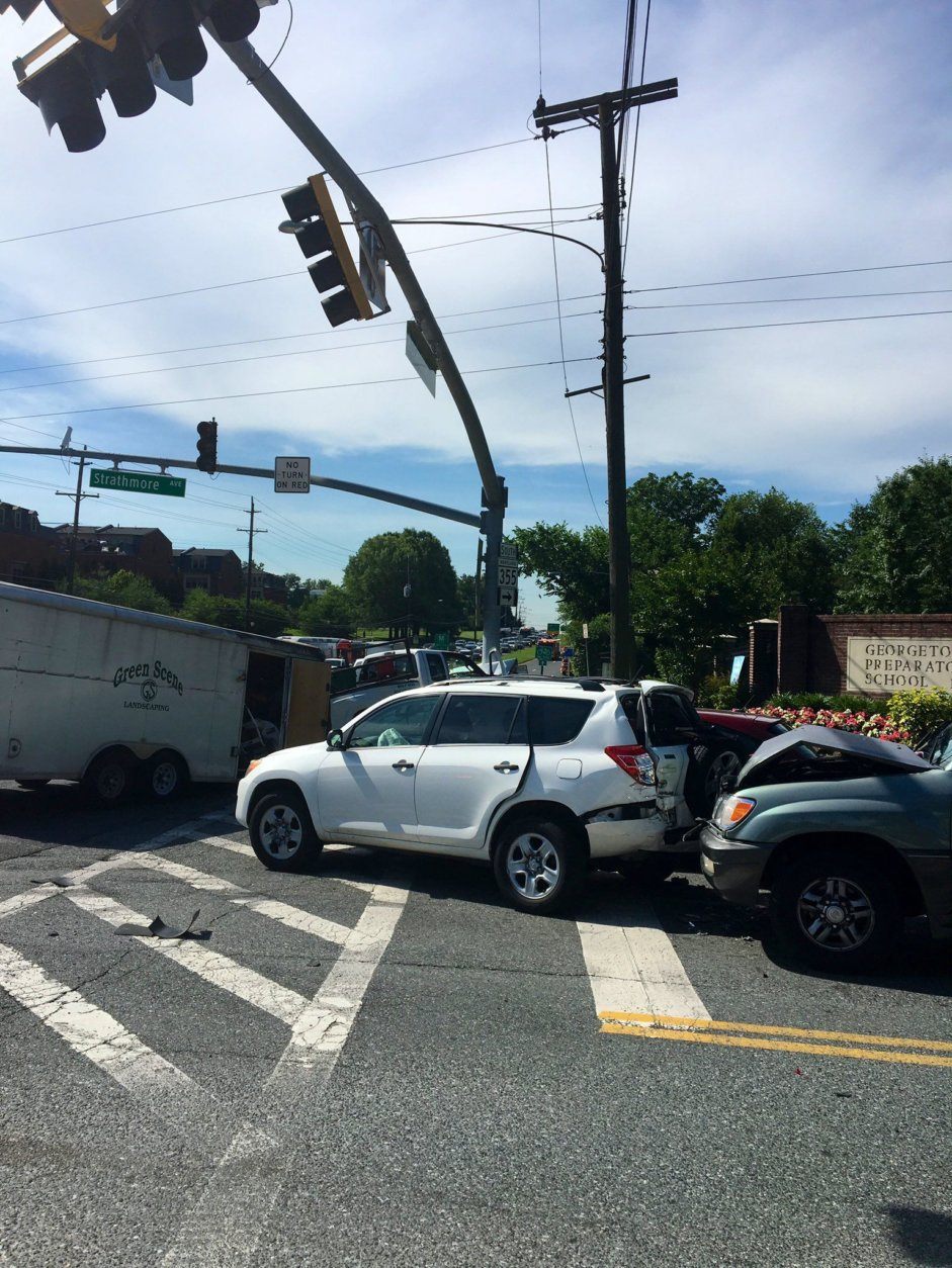 Multiple people were injured after a landscaping truck crashed Monday on Rockville Pike. (Courtesy Montgomery County Fire & Rescue)