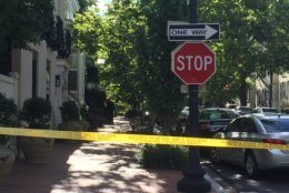 Yellow police tape is up around the Georgetown home of Jack Evans while the FBI conducts its search. (WTOP/John Domen)