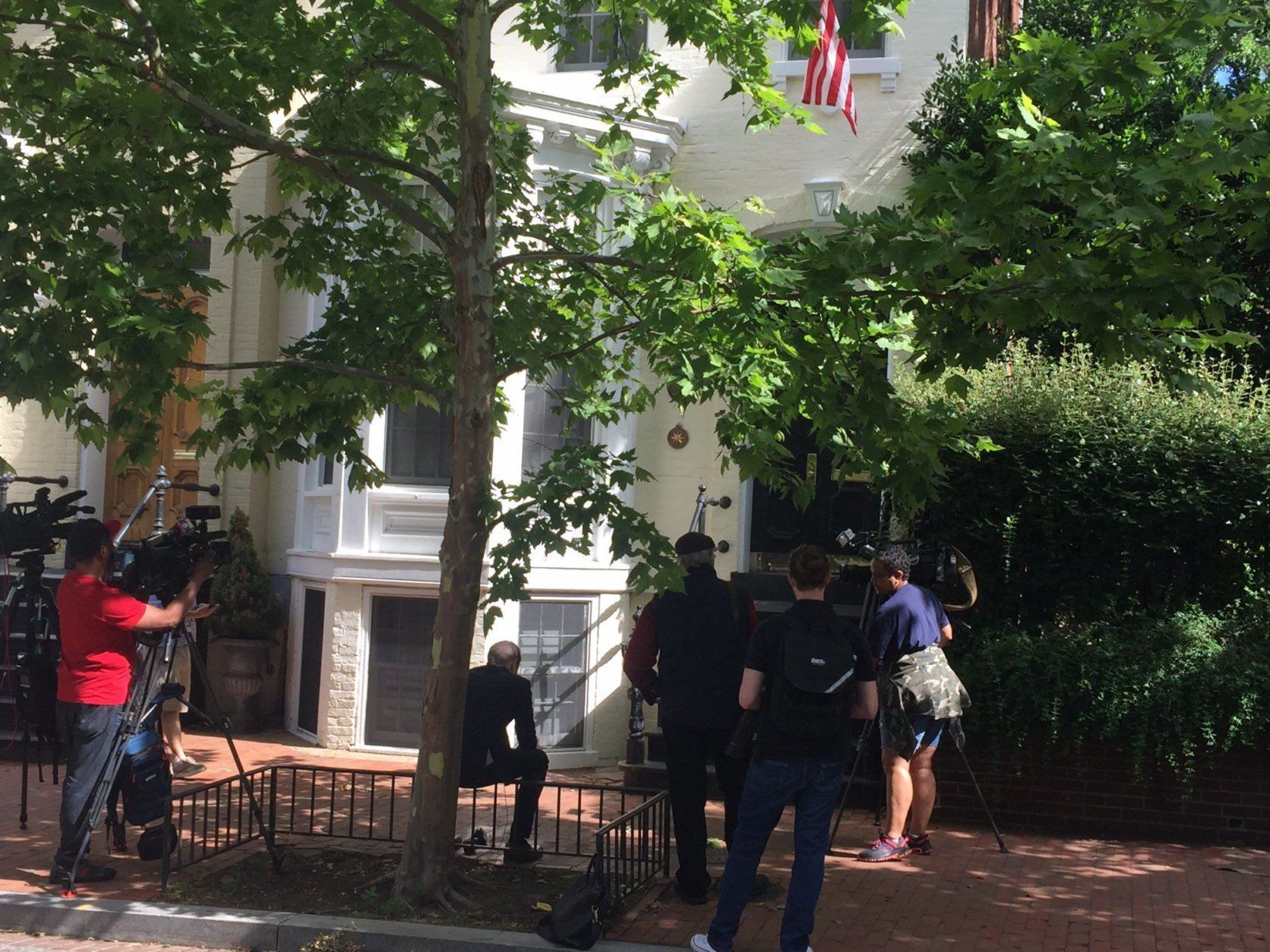 Media outside Jack Evans' home in Georgetown on Friday after an FBI search. (WTOP/John Domen)