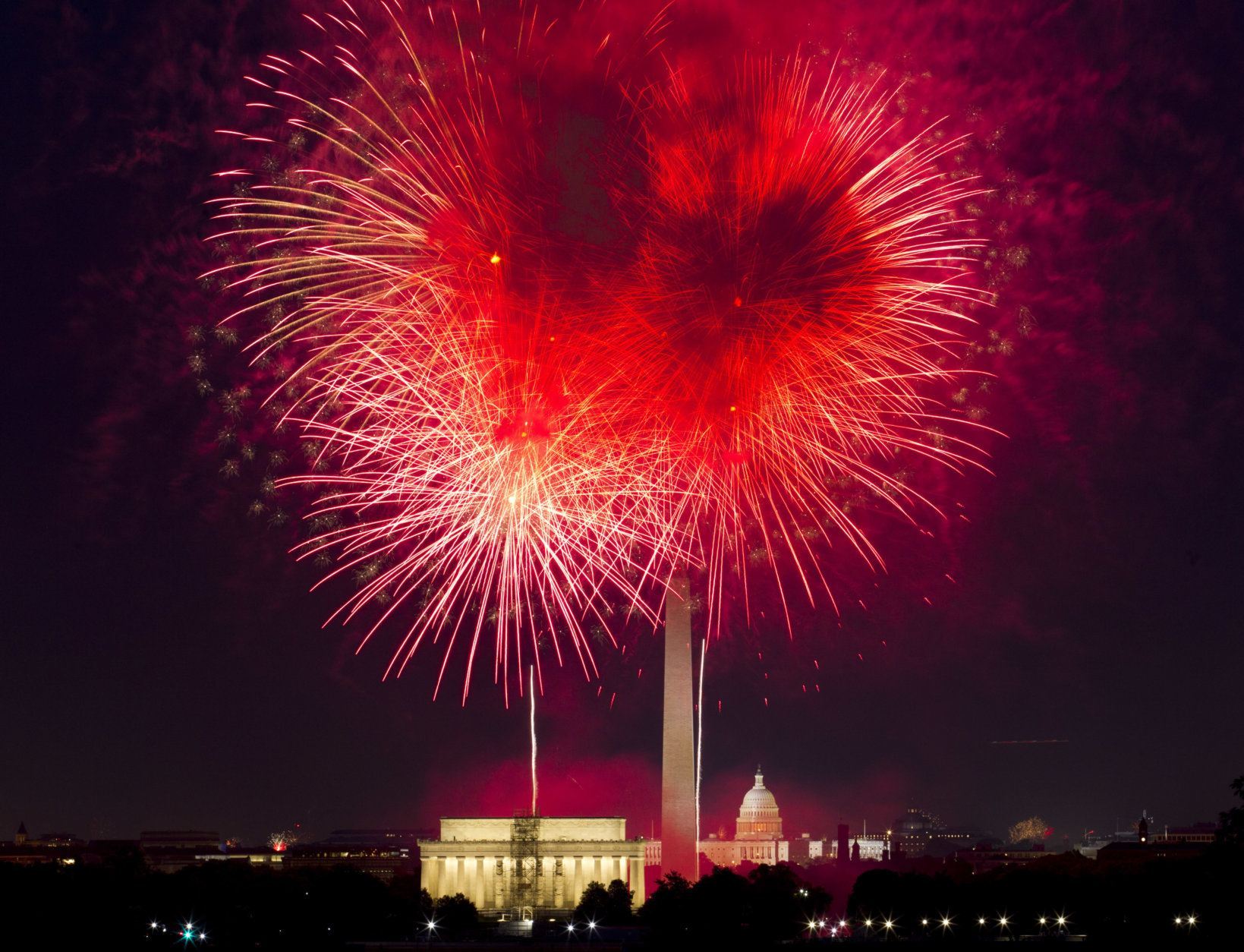 Fireworks explode over Lincoln Memorial, Washington Monument and U.S. Capitol, along the National Mall in Washington, Wednesday, July 4, 2018, during the Fourth of July celebration. (AP Photo/Jose Luis Magana)