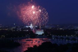 Fireworks light the sky over the U.S. Capitol, left, the Washington Monument and the Lincoln Memorial during Fourth of July celebrations, Thursday, July 4, 2013 in Washington. Surrounded by scaffolding, the Washington Monument is closed for repairs after an earthquake in 2011. (AP Photo/Alex Brandon)