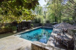 The 8,350-square-foot home includes six bedrooms, six full and two half-baths, seven fireplaces, a wine cellar, catering kitchen, and a 42-foot by 20-foot swimming pool, one of the largest residential swimming pools in the District. (Credit: HLR Partners at Washington Fine Properties)