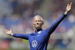 Megan Rapinoe, a forward for the United States women's national team, which is headed to the FIFA Women's World Cup, is introduced for fans during a send-off ceremony following an international friendly soccer match against Mexico, Sunday, May 26, 2019, in Harrison, N.J. The U.S. won 3-0. (AP Photo/Julio Cortez)