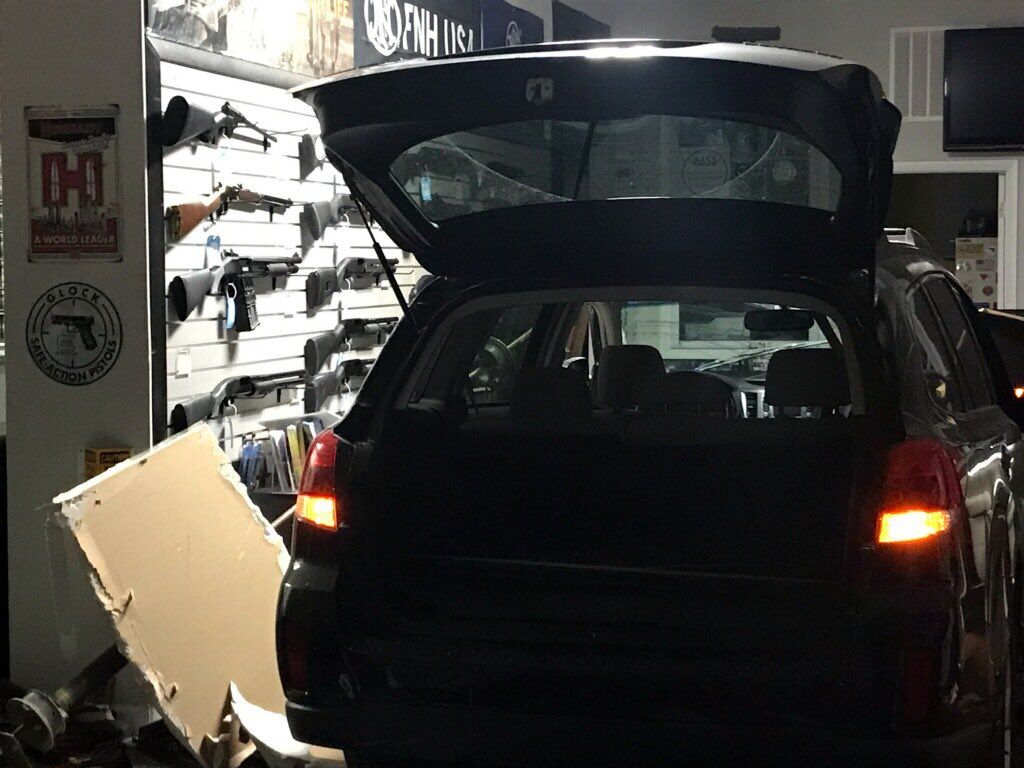 A suspect's vehicle is seen in a gun shop in Rockville after five suspects attempted to rob the store in the early morning hours of June 13, 2019. (Courtesy Montgomery County Police) 