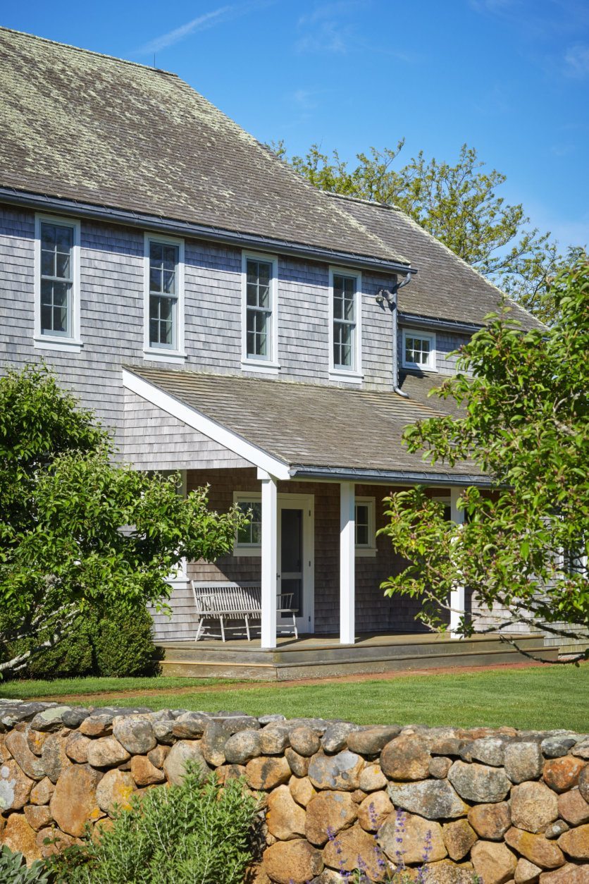 The 6,456-square-foot cedar-shingled main residence has five en-suite bedrooms, two half baths, a chef’s kitchen equipped with professional grade appliances, two offices or artist studios. Three fireplaces warm the home, and outdoor decks drink in the serene water and nature views with the dunes in the distance. (Laura Moss Photography)