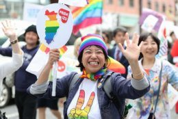 TOKYO, JAPAN - APRIL 28: Participants walk down the street during the Tokyo Rainbow Pride Parade on April 28, 2019 in Tokyo, Japan. Thousands from the Japanese LGBT community and its supporters are expected to attend the annual Tokyo Rainbow Pride festival on April 28-29 in Yoyogi Park, with the Parade taking place on April 28th. The festival takes place during pride week, which runs through to May 6.  (Photo by Takashi Aoyama/Getty Images)