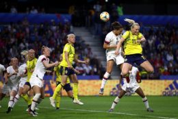 LE HAVRE, FRANCE - JUNE 20: Carli Lloyd of the USA competes for a header with Stina Blackstenius of Sweden during the 2019 FIFA Women's World Cup France group F match between Sweden and USA at Stade Oceane on June 20, 2019 in Le Havre, France. (Photo by Alex Grimm/Getty Images)