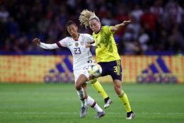 LE HAVRE, FRANCE - JUNE 20: Christen Press of the USA battles for possession with Linda Sembrant of Sweden during the 2019 FIFA Women's World Cup France group F match between Sweden and USA at Stade Oceane on June 20, 2019 in Le Havre, France. (Photo by Alex Grimm/Getty Images)
