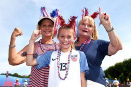 REIMS, FRANCE - JUNE 24: USA fans pose for a photo outside the stadium prior to the 2019 FIFA Women's World Cup France Round Of 16 match between Spain and USA at Stade Auguste Delaune on June 24, 2019 in Reims, France. (Photo by Robert Cianflone/Getty Images)