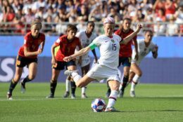 REIMS, FRANCE - JUNE 24: Megan Rapinoe of the USA scores her team's second goal from the penalty spot during the 2019 FIFA Women's World Cup France Round Of 16 match between Spain and USA at Stade Auguste Delaune on June 24, 2019 in Reims, France. (Photo by Marc Atkins/Getty Images)