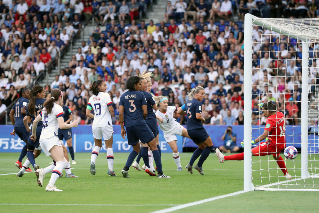 PARIS, FRANCE - JUNE 28:  Megan Rapinoe of the USA (not in frame) scores her team's first goal during the 2019 FIFA Women's World Cup France Quarter Final match between France and USA at Parc des Princes on June 28, 2019 in Paris, France. (Photo by Alex Grimm/Getty Images)