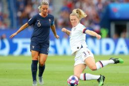 PARIS, FRANCE - JUNE 28:  Samantha Mewis of the USA is put under pressure by Amandine Henry of France during the 2019 FIFA Women's World Cup France Quarter Final match between France and USA at Parc des Princes on June 28, 2019 in Paris, France. (Photo by Richard Heathcote/Getty Images)
