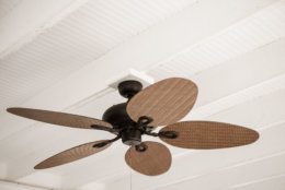 Low Angle View of a rustic ceiling fan in an old house
