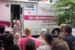 "Everyone doesn't have the resources to have a private doctor," six month breast cancer survivor Erica Walls said at the MobileMammo ribbon cutting. "They're bringing it to the community and broadening and leveling the playing field for something that's basically a human right — health care." (WTOP/Kristi King)