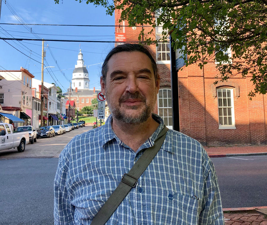 John Schumaker has lived in Annapolis for 10 years. Maryland Avenue, he said, has the feel of a small English village where everyone knows everyone else, yet people aren't intrusive. (WTOP/Kate Ryan)