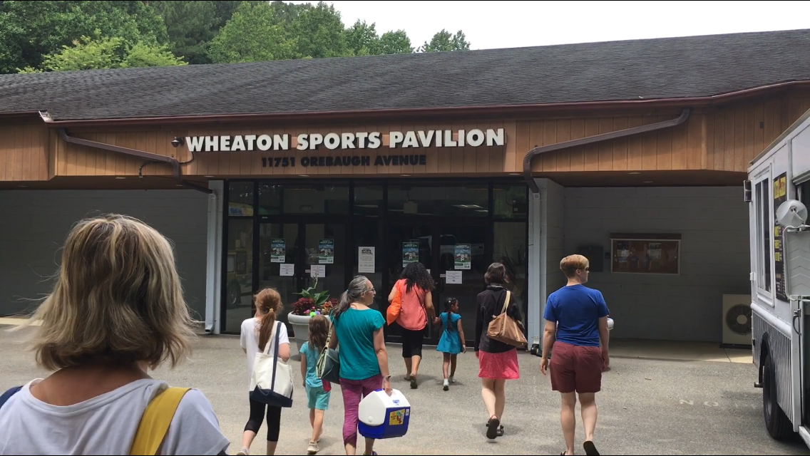 Fans stream into the Wheaton Sports Center in Montgomery County, Maryland, to watch the U.S. Women's National Soccer team play Chile. (WTOP/Liz Anderson)