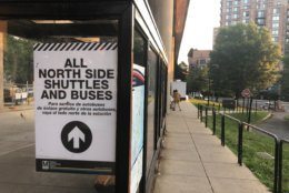 Signs have been posted alerting riders to the changes to the Huntington-Pentagon Express shuttle routes. (WTOP/Melissa Howell)