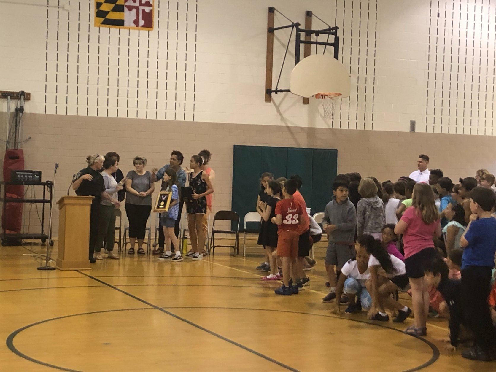 Two Oakland Terrace Elementary School students were recognized Tuesday in Silver Spring, Maryland, for their quick thinking while patrolling just outside the school after a kindergartner ran toward oncoming traffic. (WTOP/Melissa Howell)