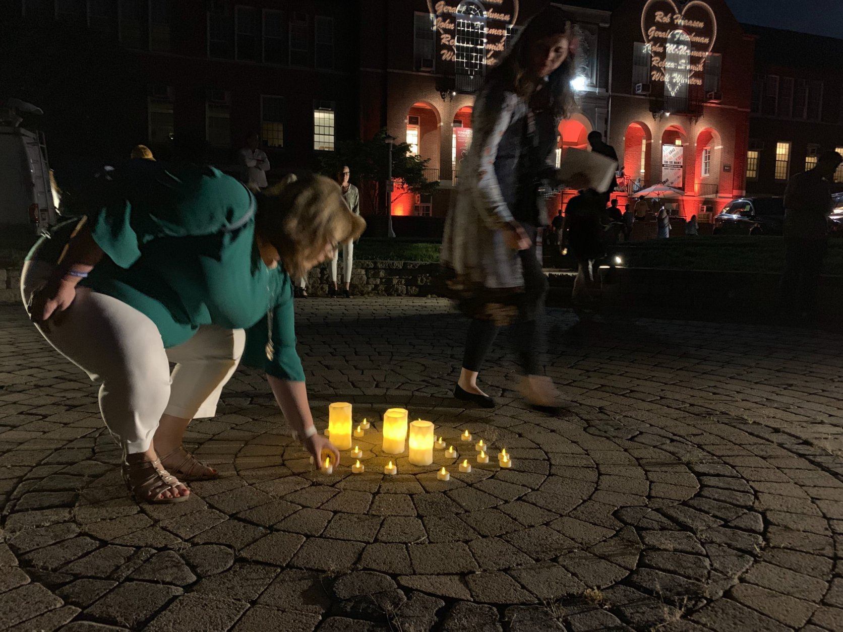 Following a memorial concert, candlelight vigil outside the Maryland Hall, in honor of the five victims of the Capital Gazette shooting. (WTOP/Mike Murillo)