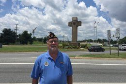 Phillip Holdsclaw in front of the Peace Cross in Prince George's County, Maryland. (WTOP/John Domen)