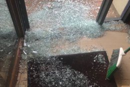 The suspects smashed the glass front doors on all three shops to gain entry into to the businesses in the shopping center that's located on the edge of Rock Creek Park. (WTOP/Dick Uliano)