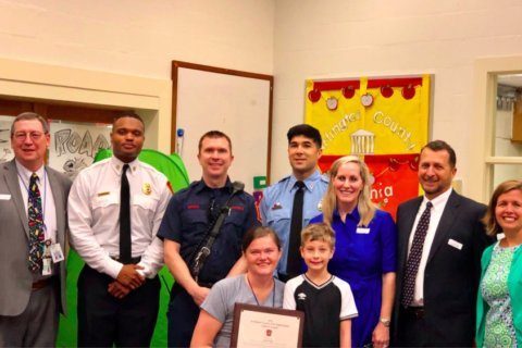 Arlington teacher honored after saving choking student