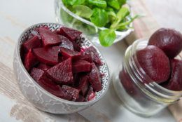 red beetroot cutting into pieces in a bowl