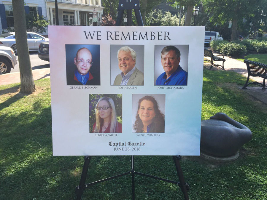 Dozens gathered in Annapolis on Friday to mark the anniversary of the shooting massacre inside the Capital Gazette newsroom, and to honor the five employees slain that day. (WTOP/John Domen)