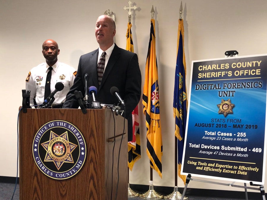 Sheriff Troy D. Berry (left) and Capt. Joseph Pratta announce Charles County's new Digital Forensics Unit. (WTOP/Kristi King)