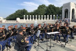 A military band accompanied the proceedings at the World War II Memorial Thursday to mark D-Day's 75th anniversary. (WTOP/John Aaron)