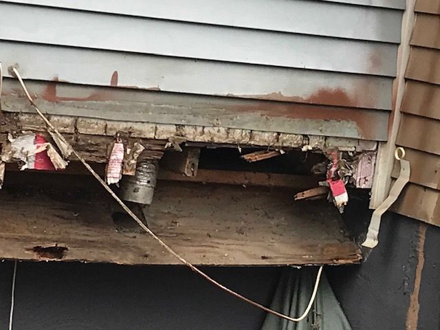 This photo from a Germantown home where a deck collapsed Saturday shows a band board that is practically gone.  (Courtesy Montgomery County Department of Permitting Services)