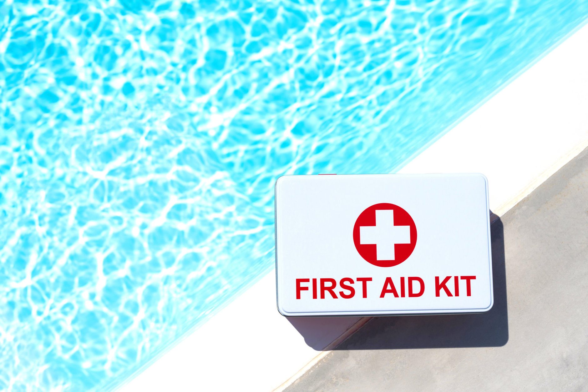 First aid kit near swimming pool. Concept