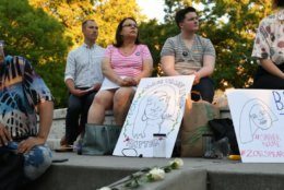 Supporters gathers in Dupont Circle on Friday, June 21, 2019, for a vigil for victims of violence in the the LGBTQ community. (WTOP/Alejandro Alvarez)